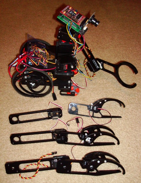 Several assembled robot arm versions