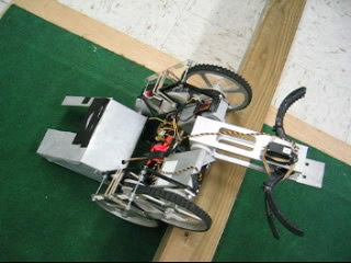 Wall Climbing Robot with Arm
