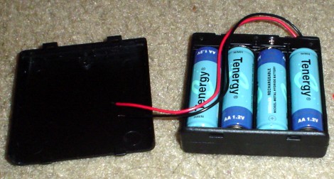 Put 4 NiMH Batteries into Battery Pack